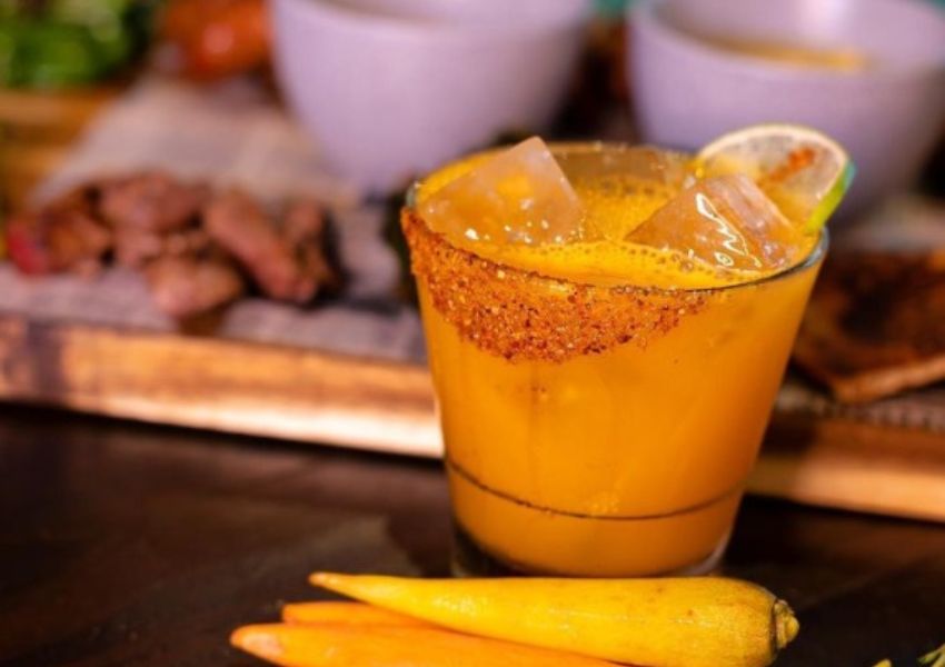 orange drink fromn cocktail bar copper shaker in tampa bay